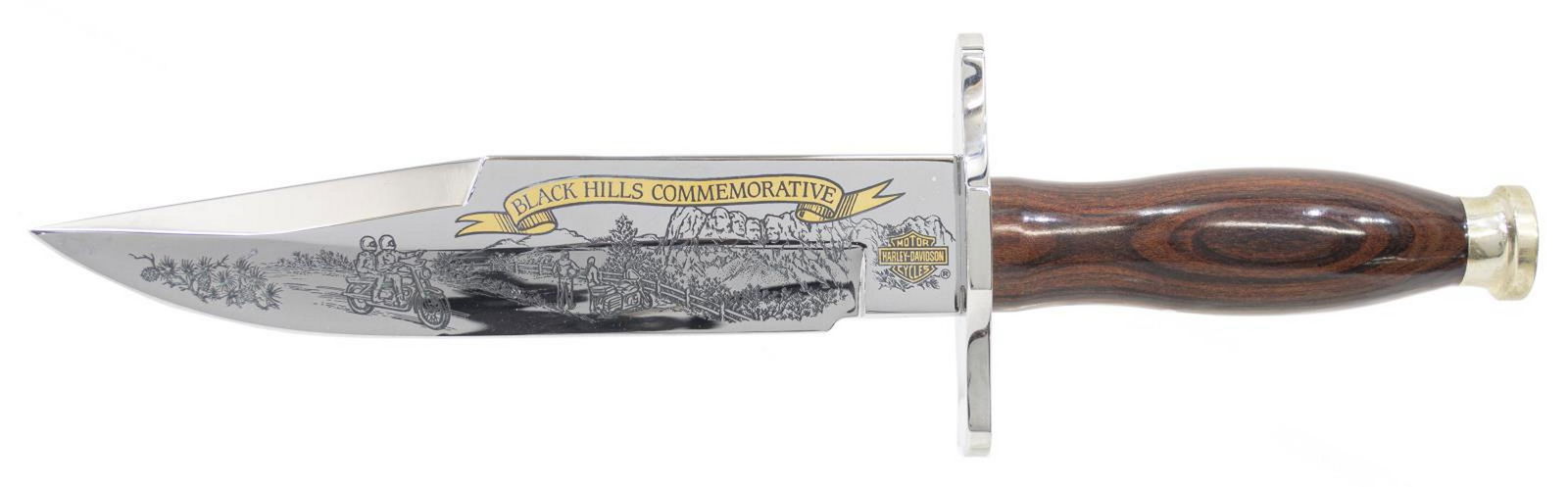 BUCK BLACK HILLS COMMEMORATIVE KNIFE & DISPLAY: Buck "Black Hills Commemorative" knife, built for Harley Davidson Motor Cycles, numbered 2181 in a limited edition of 3000, a single edge 7 5/8"l, overall: 12 3/8"l, housed in a glass top wood present