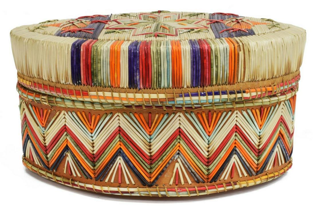 GREAT LAKES WOODLANDS QUILLED TRINKET BASKET: Native American quilled trinket basket, Great Lakes Woodland (Chippewa), c.1900, the oval basket composed of birch bark, overlaid with polychrome aniline dyed porcupine quills, a chevron pattern encir