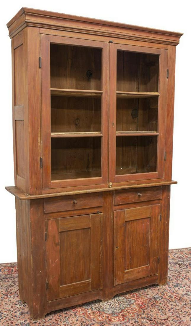 TEXAS PRIMITIVE RED WASH PINE PIE SAFE CABINET: American Primitive red washed pine pie safe, Texas, late 19th c., molded cornice, upper double doors lacking inset panels, lower case with two drawers over two cabinet doors, rising on bracket feet, o