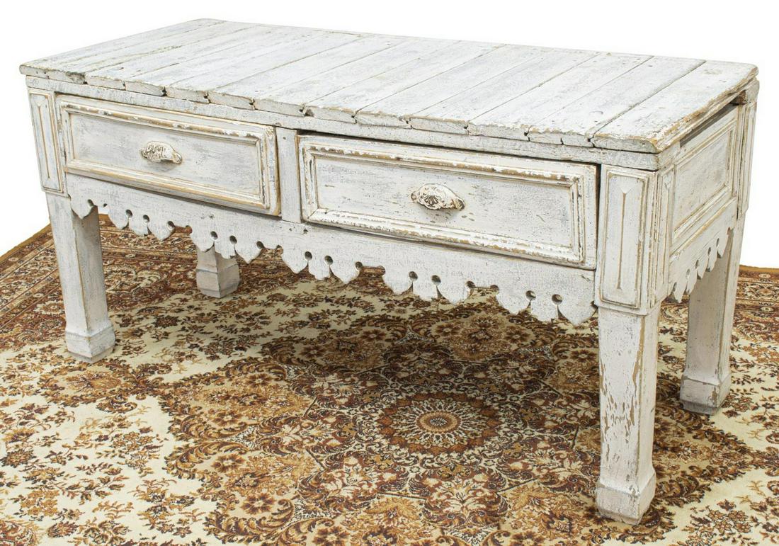 RUSTIC DISTRESSED PAINTED PLANK TOP CONSOLE TABLE: Rustic console/ work table, in a distressed painted finish, plank top, over two drawers, decorative carved apron, rising on block legs, back unfinished, approx 28.75"h, 57.5"w, 23.75"d Start Price: $1