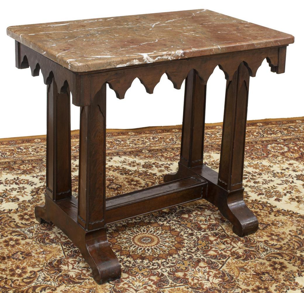 AMERICAN GOTHIC REVIVAL MARBLE-TOP TABLE: American Gothic Revival table, late 19th c., marble top, over trefoil arch apron, vertical supports joined by center stretcher, wood loss at base, approx 28"h, 31.75"w, 19.5"d Start Price: $80.00
