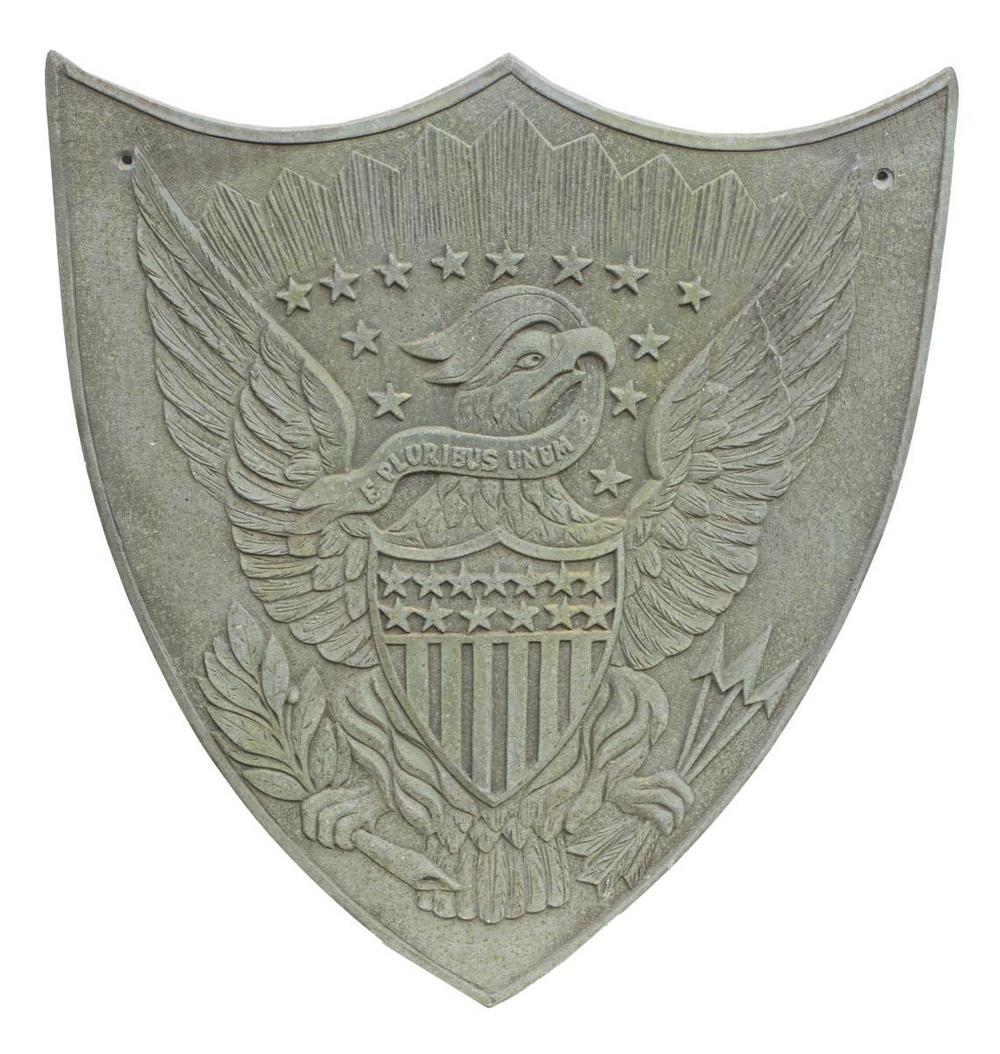 ARCHITECTURAL CAST METAL FEDERAL SHIELD: Architectural cast metal federal shield, with a verde patina finish, depicting a bald eagle holding the Centennial Shield, approx 24.5"l, 21.5"w, 25lbs **Provenance: From the estate of Dr. James R. Lu