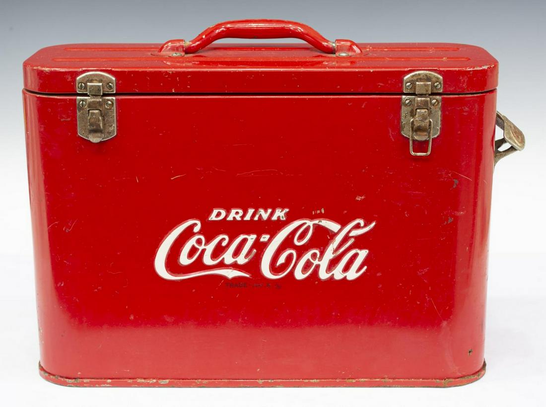 VINTAGE 'DRINK COCA-COLA' ICE CHEST COOLER: Vintage Coca-Cola ice chest cooler, mid 20th c., with handle to hinged top, opens to interior storage, marked "Drink Coca-Cola" to front and back, bottle opener to one side, some wear to finish, appro