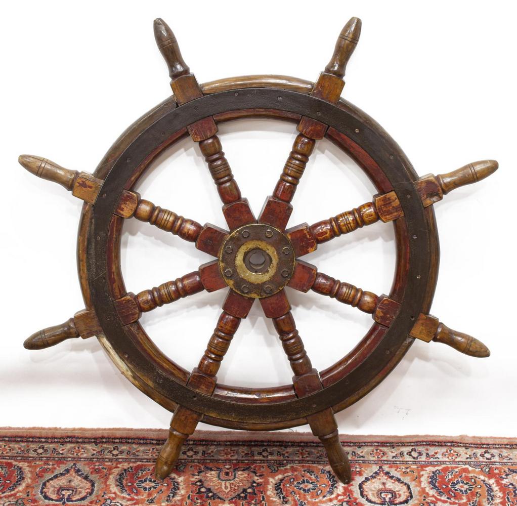 LARGE METAL-MOUNTED WOOD SHIP'S WHEEL, 48"DIAM: Large metal-mounted ship's wheel, remnants of painted finish, approx 48"diam Start Price: $40.00