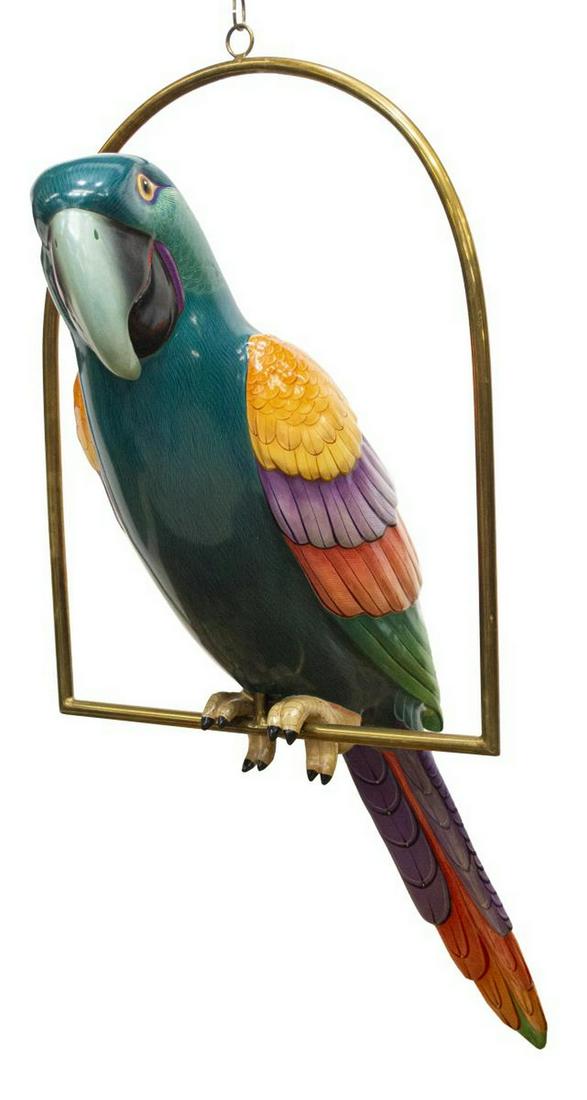 SERGIO BUSTAMANTE (B.1942) PARROT SCULPTURE: Painted papier-mache sculpture, Macaw Parrot, signed Sergio Bustamante (Mexican, b.1942/ 1943), numbered 44/ 100, on brass hanging perch, parrot: approx 58"h, 13"w, perch: approx 29.5"h, 22.75"w (meas
