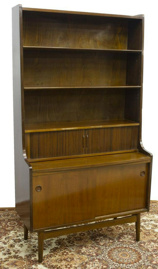 DANISH JOHANNES SORTH MID-CENTURY MODERN BOOKCASE: Danish mid-century modern bookcase, Johannes Sorth, c.1960s, upper section having three shelves, tambour doors reveal five drawers and sectional storage, over lower case with two sliding doors, openin