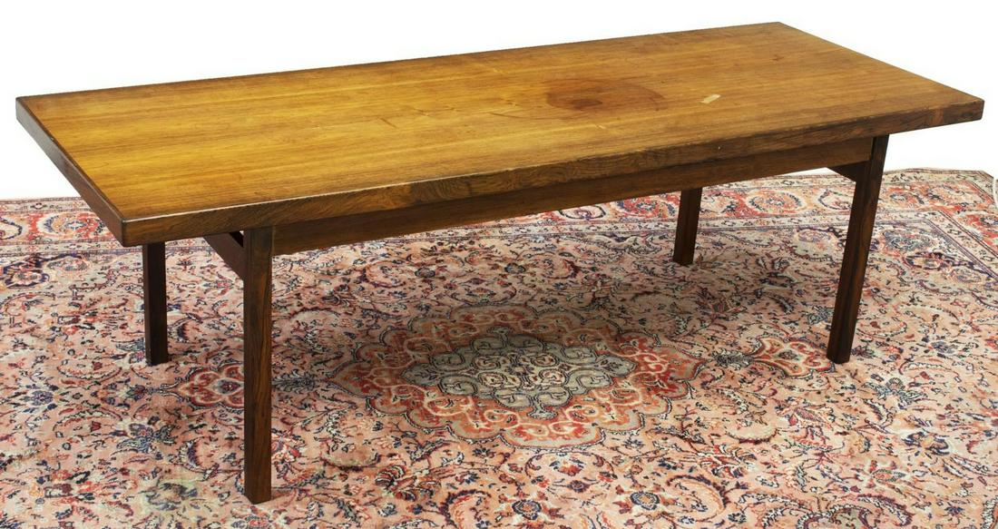 DANISH MID-CENTURY MODERN TEAK COFFEE TABLE: Danish mid-century modern teak coffee table, c.1960s, long rectangular tabletop, rising on straight legs, discoloration to top, approx 20"h, 63"w, 23.75"d Start Price: $100.00