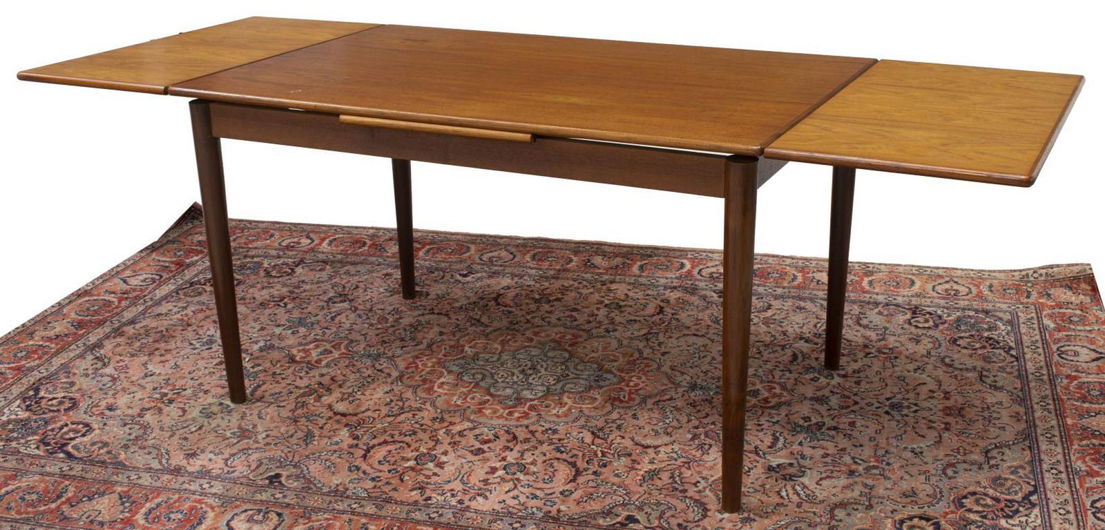 DANISH MID-CENTURY MODERN EXTENSION DINING TABLE: Danish mid-century modern teak extension table, c.1950s, rectangular tabletop over two draw leaves, rising on tapered legs, approx 29"h, 51"w, 33"d, extended: approx 86"w Start Price: $200.00
