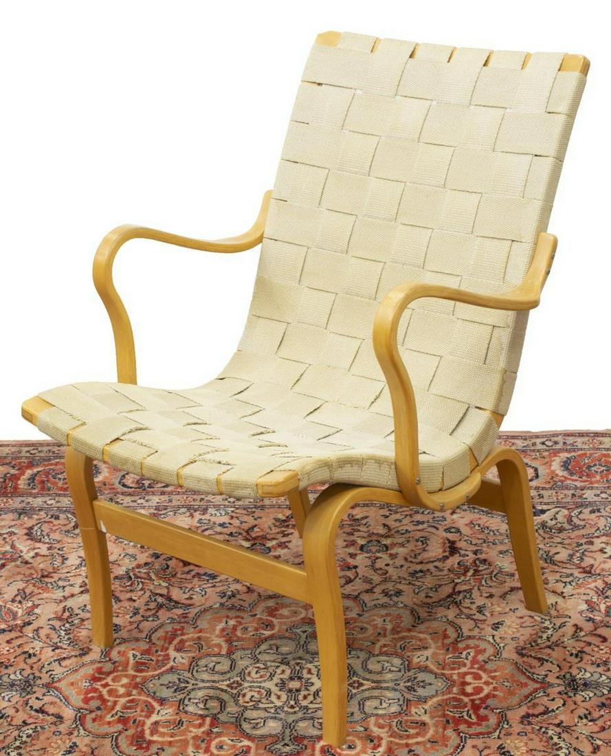 MID-CENTURY BRUNO MATHSSON 'EVA' BENTWOOD ARMCHAIR: Mid-century modern "Eva" armchair, designed by Bruno Mathsson (Swedish, 1907-1988) for Dux, c.1960s, woven canvas web, on a bentwood beech frame, approx 32.75"h, 23.25"w, 24"d Start Price: $250.00
