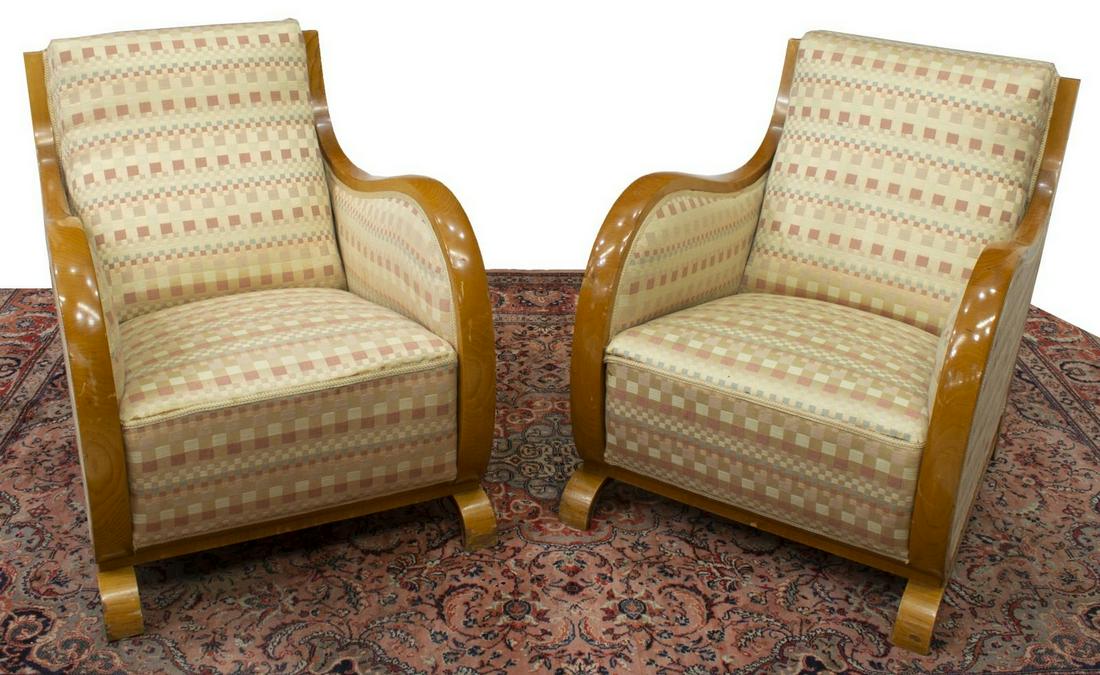 (2) ART DECO STYLE RECLINED LOUNGE CHAIRS: (pair) Art Deco style reclined lounge chairs, mid 20th c., wood frame, slightly reclined back, checkered pattern upholstery, curved arms, small stains to upholstery, approx 30.5"h, 24"w, 33.25"d Start
