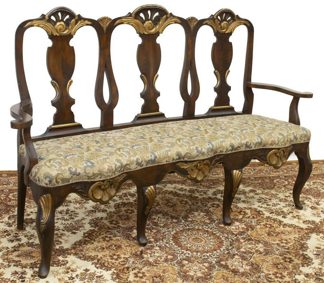 QUEEN ANNE STYLE PARCEL GILT TRIPLE-BACK SETTEE: Queen Anne style chair-back settee, 20th c., parcel gilt frame, with carved and pierced crests, vase-shaped splats, curved arms, over upholstered bench seat, scalloped apron with gilt-highlighted shel
