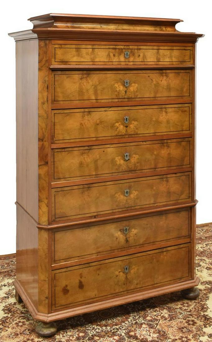 DANISH BIEDERMEIER WALNUT CHEST ON CHEST: Danish Biedermeier walnut chest on chest, mid 19th c., having a shaped cornice, over seven drawers, rising on bun feet, approx 63.5"h, 40.5"w, 20.25"d Start Price: $450.00