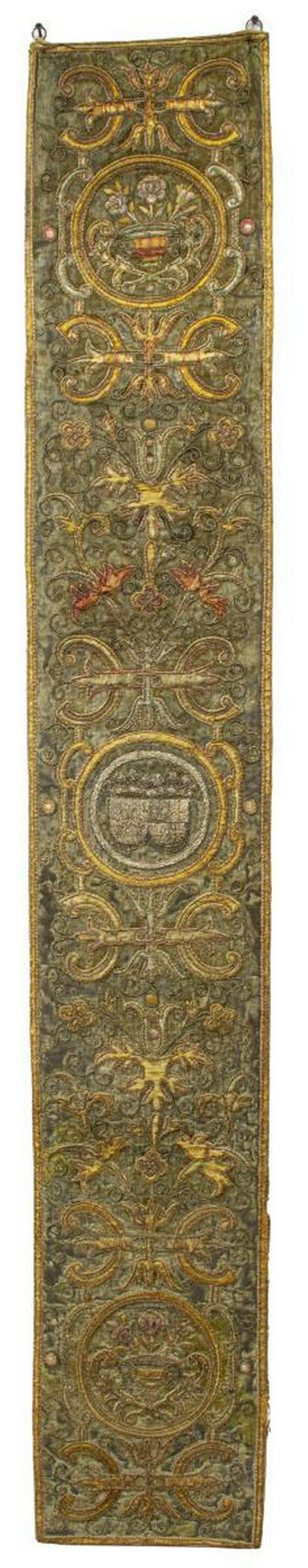 18TH/19THC CONTINENTAL GOLD WIRE EMBROIDERY PANEL: Continental hanging tapestry, 18th/ 19th c., narrow runner-form, couched embroidery with metallic threads, heraldic and floral motifs against worn velvet ground, approx 62.25"l, 9.75"w, 1.25lbs Start 