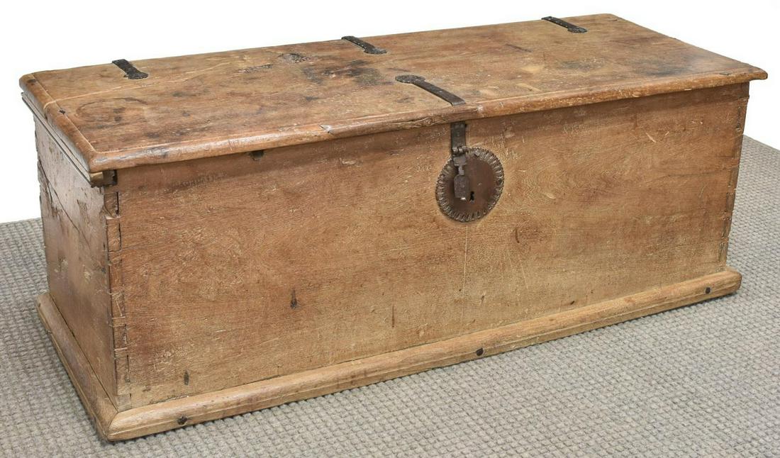 SPANISH COLONIAL NEW MEXICO SABINO WOOD TRUNK: Spanish Colonial sabino wood trunk, New Mexico/ Mexico, 19th c., visible dove tail construction, top with iron hinges and lock hardware, open interior with side till, rising on a molded base, approx 2