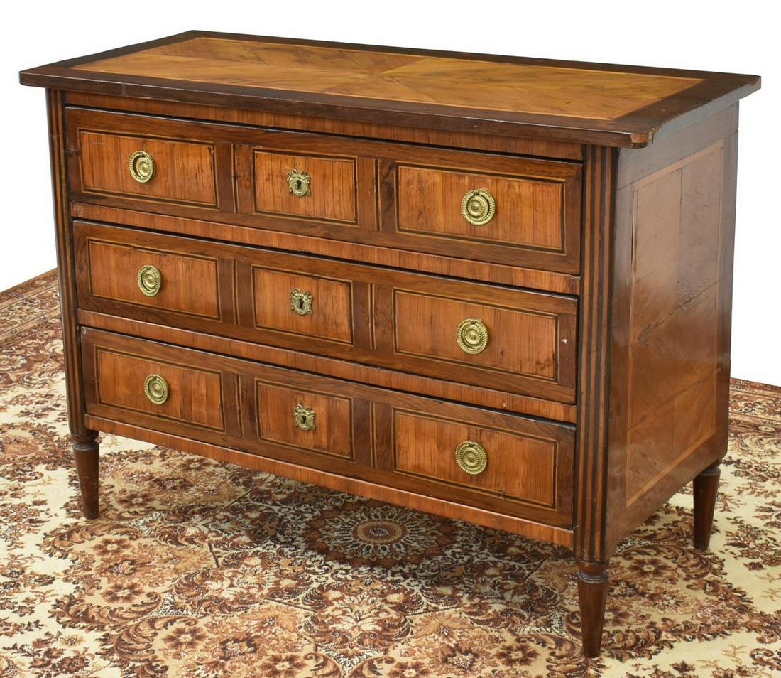 FRENCH LOUIS XVI PERIOD COMMODE, 18TH C.: French Louis XVI period commode, 18th c., banded top over case fitted with three drawers, contrasting string inlay, rising on tapered legs, some restoration, approx 31"h, 42.5"w, 18.75"d Start Price: 