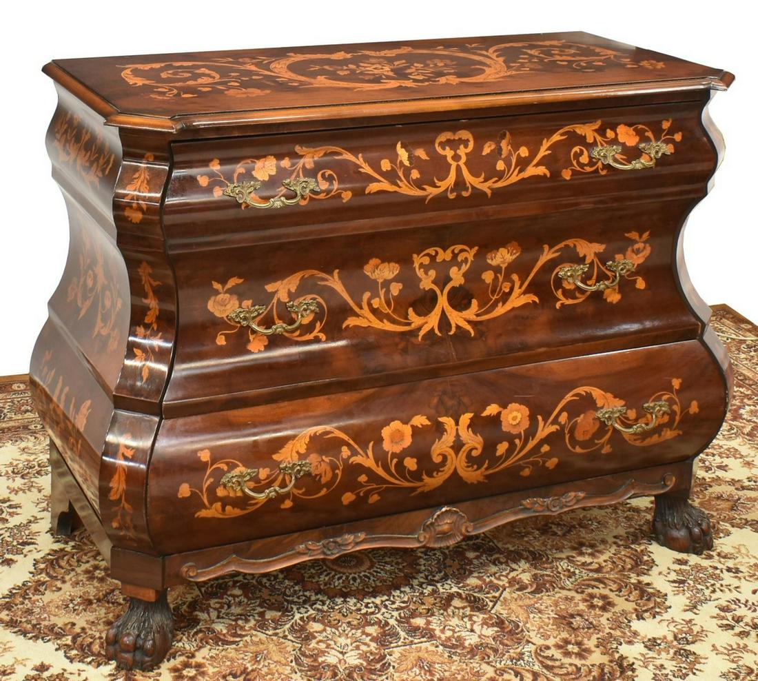 ELABORATE DUTCH FLORAL MARQUETRY BOMBE COMMODE: Dutch figured wood chest of drawers, 20th c., shaped case fitted with three drawers, elaborate floral marquetry, carved foliate accents at apron, rising on paw feet, approx 35.5"h, 44.75"w, 20"d Start