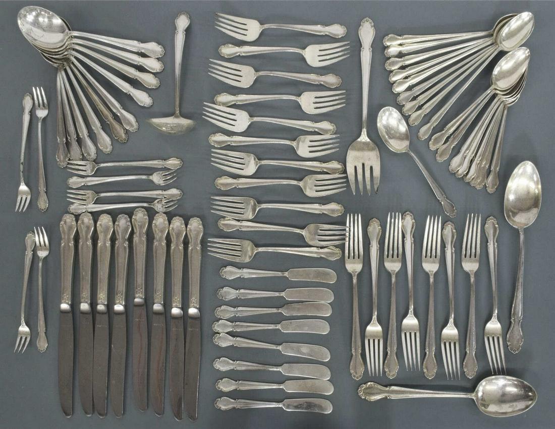 (75) ROGERS 'WEDDING BELLS' STERLING FLATWARE: (lot of 75) American sterling silver flatware, Wm. Rogers Mfg. Co. (International Silver Company), in the "Wedding Bells" pattern, designed by Alexandra A. Dabrowski, including: (8) hollow handle knif