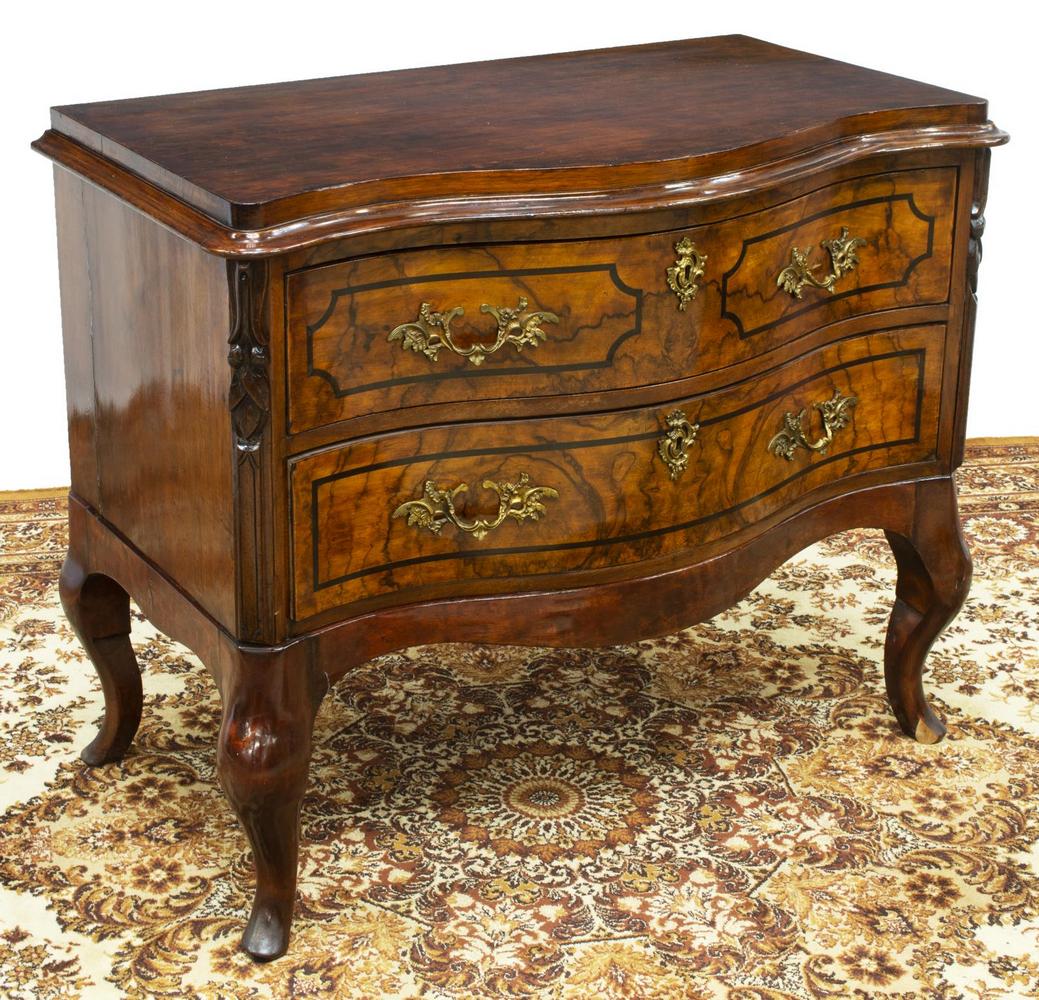 CONTINENTAL SERPENTINE TWO-DRAWER COMMODE: Continental serpentine commode, 19th c., fitted with two burlwood-faced drawers, top drawer interior divided into three sections with sliding panels, rising on cabriole legs, loss to front right foot,