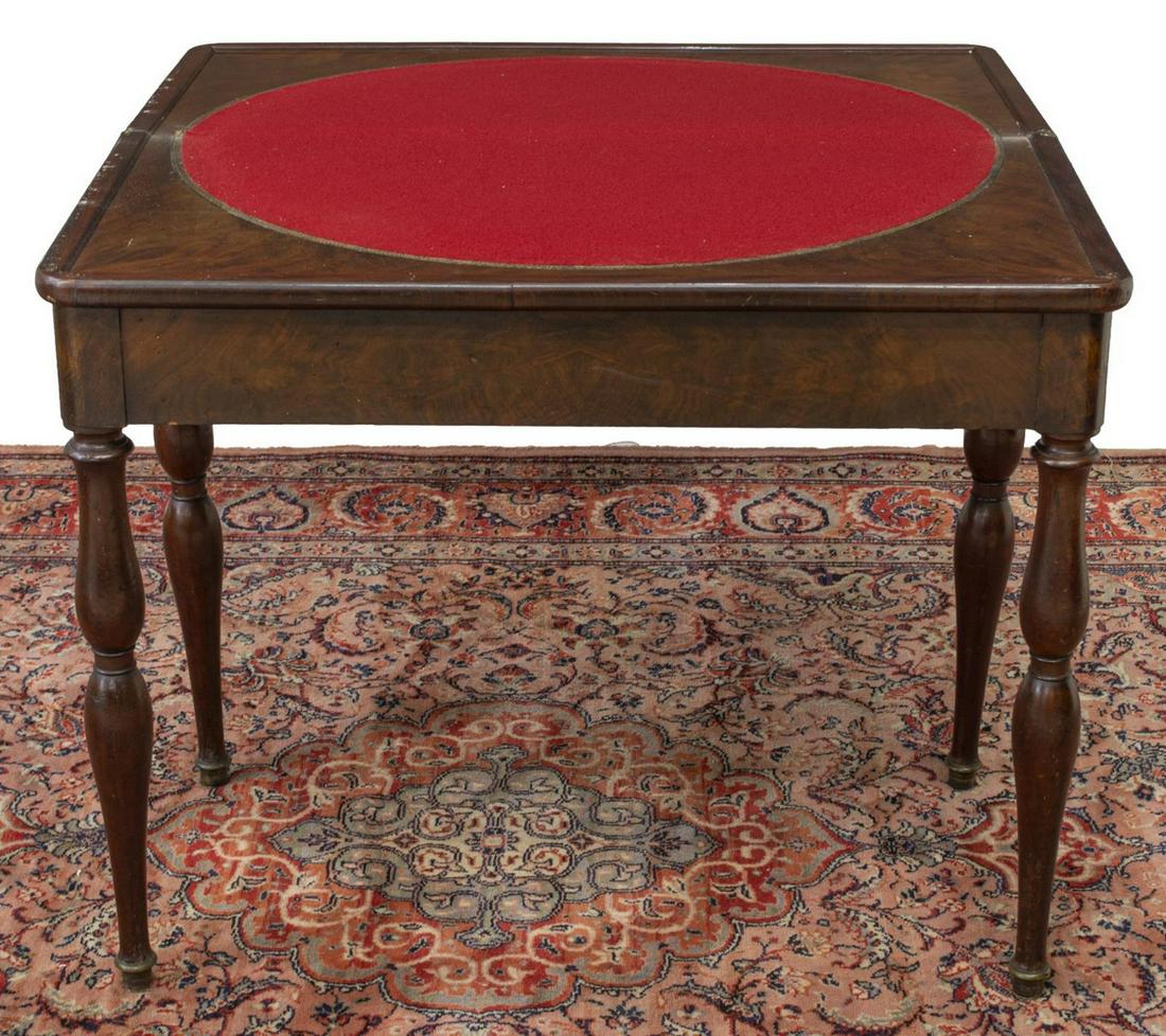 FRENCH LOUIS PHILIPPE PERIOD MAHOGANY GAMES TABLE: French Louis Philippe period mahogany games table, mid 19th c., hinged top opening to inset red felt playing surface, rising on turned legs, closed: approx 28"h, 34.25"w, 17"d Start Price: $150.00