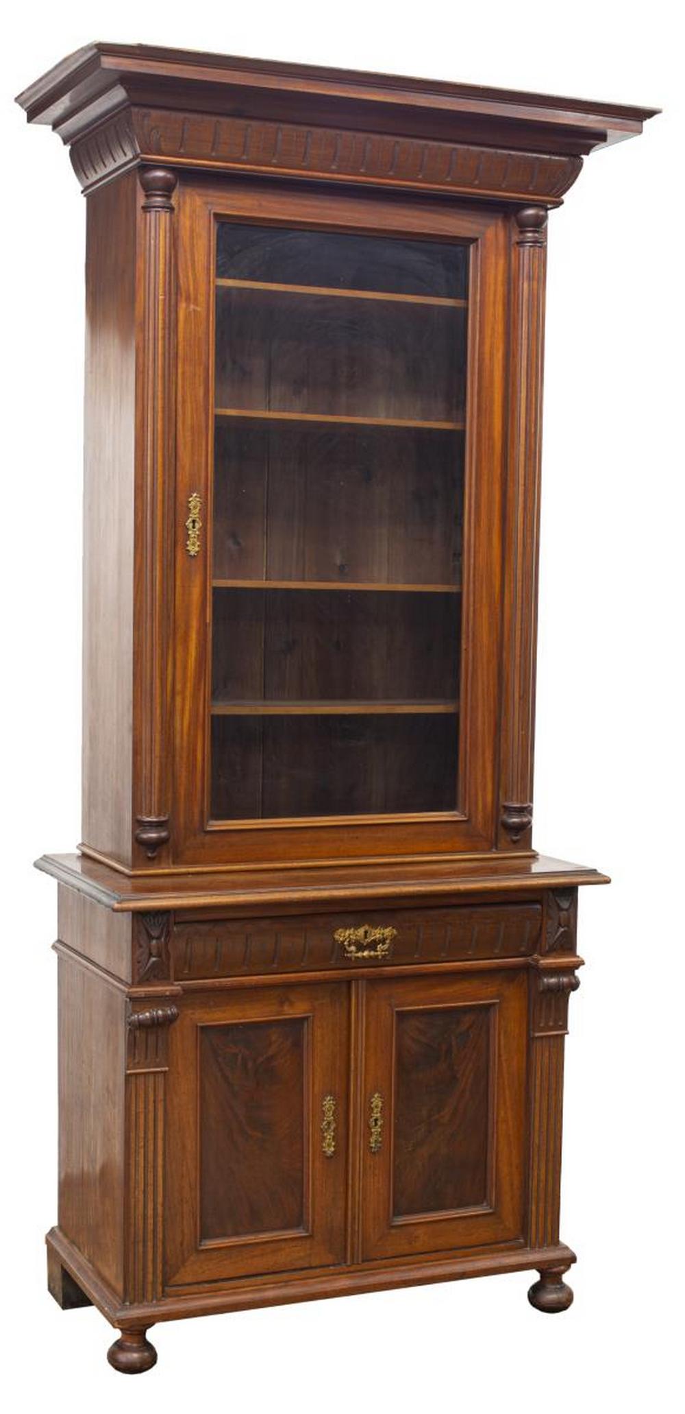 DANISH UPRIGHT GLAZED DISPLAY CABINET: Danish glazed display cabinet, having a molded cornice, glazed cabinet door, opening to interior shelves, flanked by fluted columns and carved foliate accents, lower case with a single drawer over dou