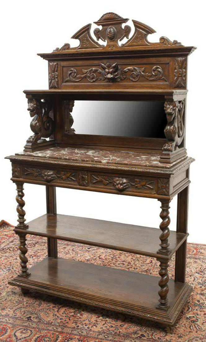 FRENCH HENRI II STYLE MARBLE-TOP OAK SERVER: French Henri II style oak server, 19th c., raised backsplash with shield crest, open shelf on carved grotesque corbels, back with beveled mirror plate, over inset marble top, framed by lunette molding