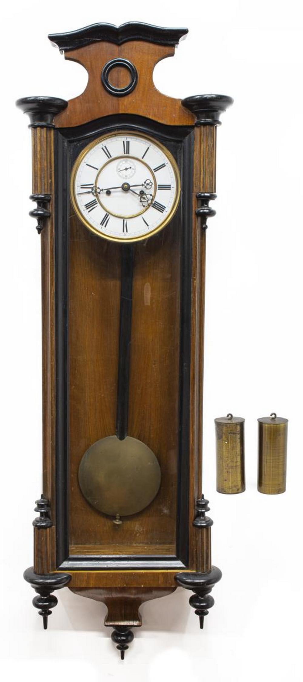 CONTINENTAL TWO-WEIGHT REGULATOR WALL CLOCK: Continental regulator wall clock, late 19th c., parcel ebonized walnut case, glazed door and side panels, housing white enamel dial with black roman numerals, seconds subdial, weight-driven time and s