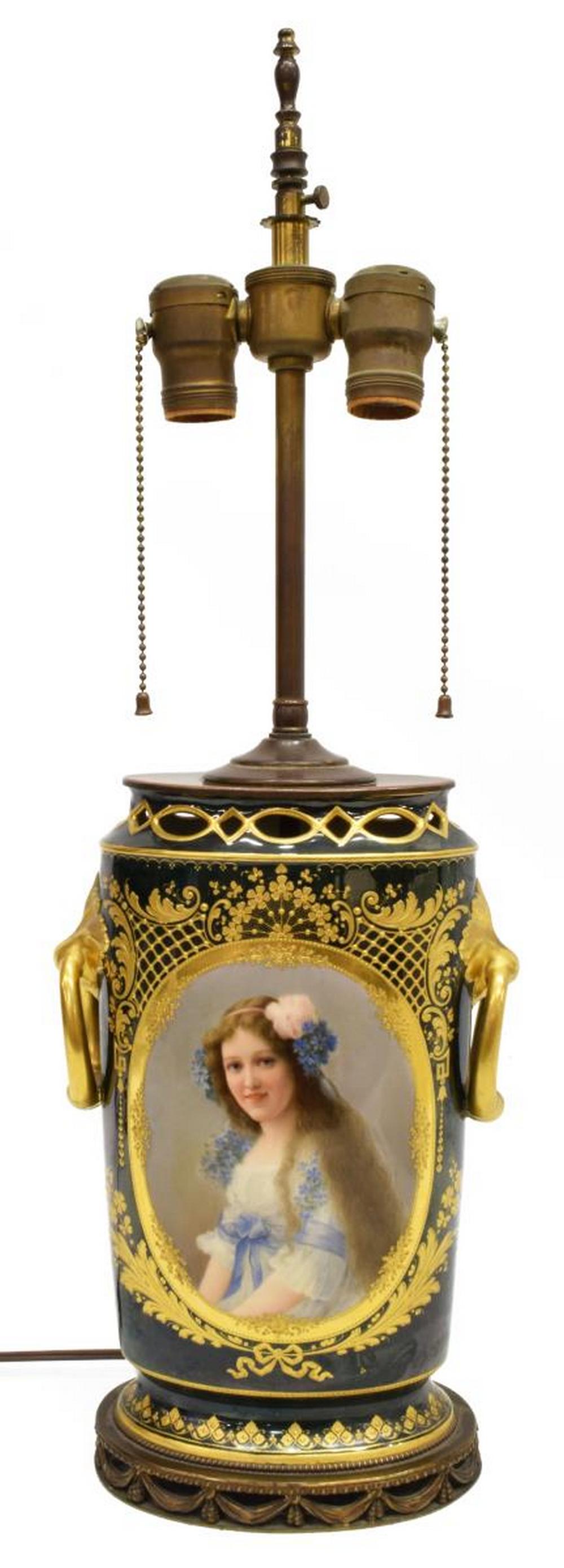 HAND-PAINTED & GILT PORCELAIN URN TABLE LAMP: Porcelain urn, now fashioned as a two-light table lamp, with raised parcel gilt enamel decoration, hand-painted reserve with beautiful maiden, urn: approx 11"h, overall (including shade): approx 24.25