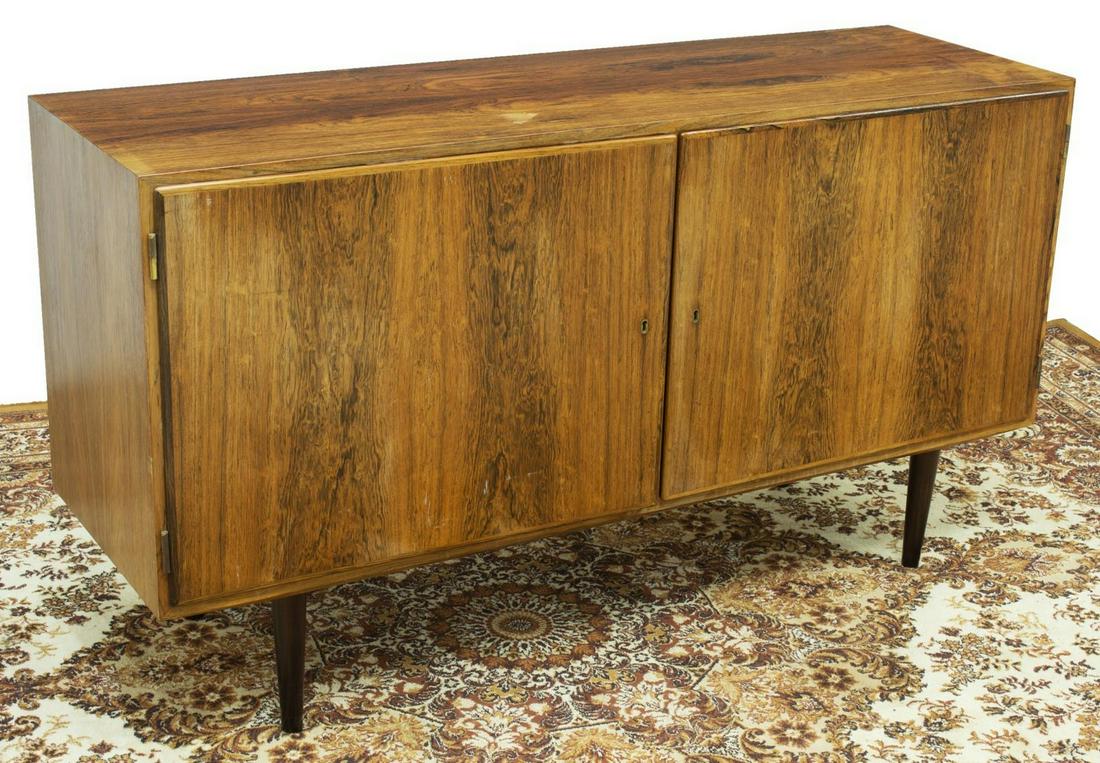DANISH MID-CENTURY MODERN ROSEWOOD SIDEBOARD: Danish mid-century modern rosewood sideboard, Poul Hundevad, c.1960s, fitted with two doors, opening to one adjustable shelf and single drawer, rising on tapered legs, tonal variation to top, approx 3
