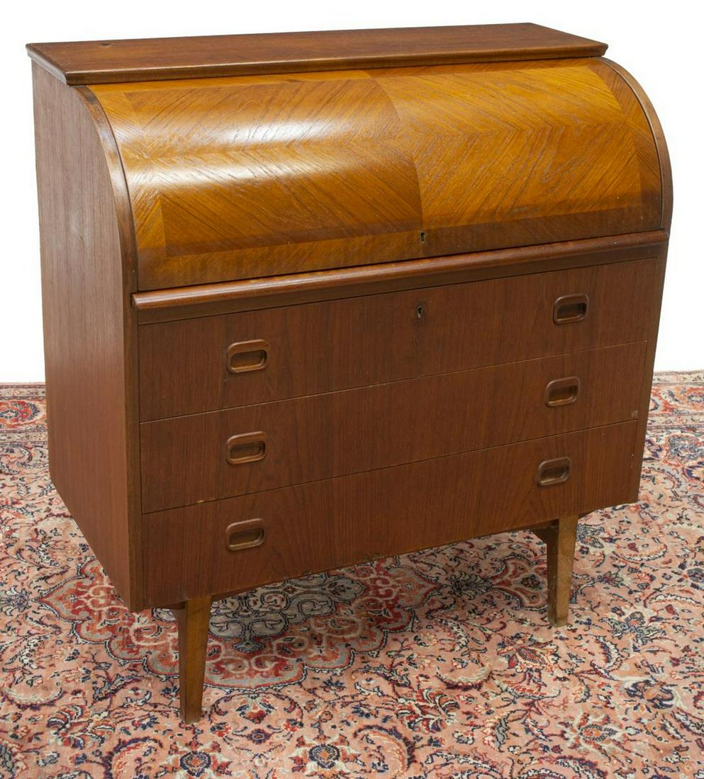 DANISH MID-CENTURY MODERN TEAK BUREAU DESK: Danish mid-century modern teak bureau, c.1950s, cylinder top, opening to interior fitted with shelves and drawers, over pull-out writing surface, above three drawers, rising on tapered legs, approx 38