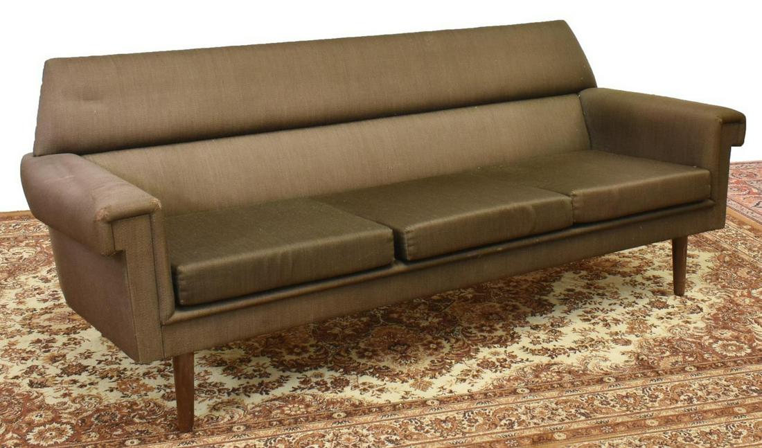 DANISH MID-CENTURY MODERN UPHOLSTERED 3-SEAT SOFA: Danish mid-century modern sofa, c.1950s-1960s, having dark brown upholstery to back, seat, and armrests, rising on tapered wood legs, wear to left arm, approx 29"h, 76"w, 30"d Start Price: $250.00