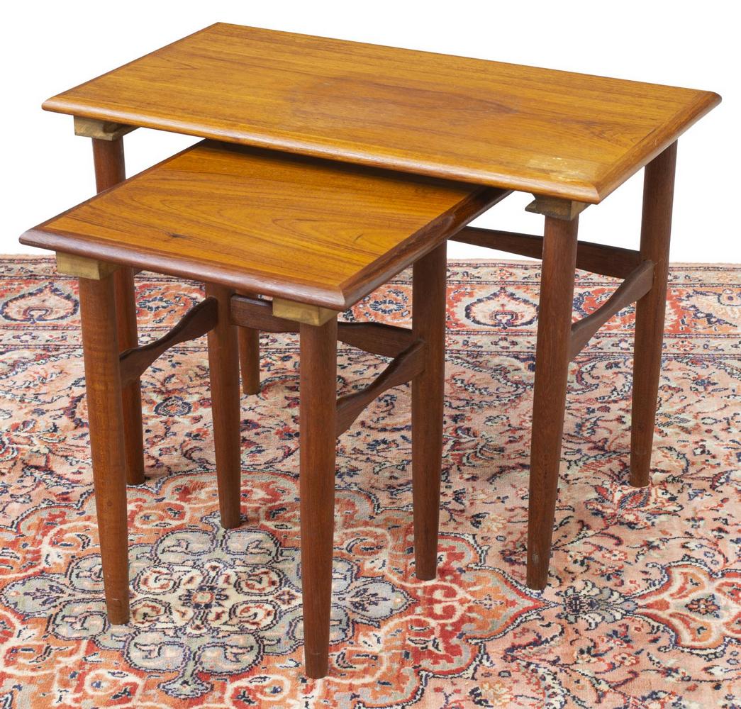(2) DANISH MID-CENTURY MODERN TEAK NESTING TABLES: (lot of 2) Danish mid-century modern teak nesting tables, c.1950s, graduated sizes, rectangular top, on stretcher-joined tapered legs, largest: approx 18.75"h, 25.5"w, 14"d Start Price: $80.00