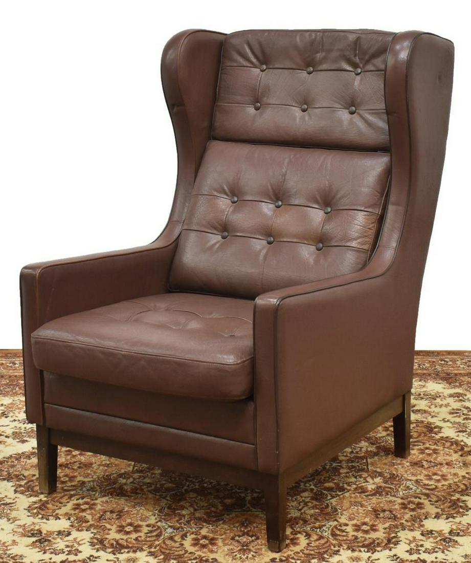 DANISH MID-CENTURY MODERN WINGBACK ARMCHAIR: Danish mid-century modern wingback armchair, c.1960s, in brown upholstery, having removable button-tufted cushions to back and seat, on rectangular wood legs, approx 41"h, 27.5"w, 34"d Start Price: $1