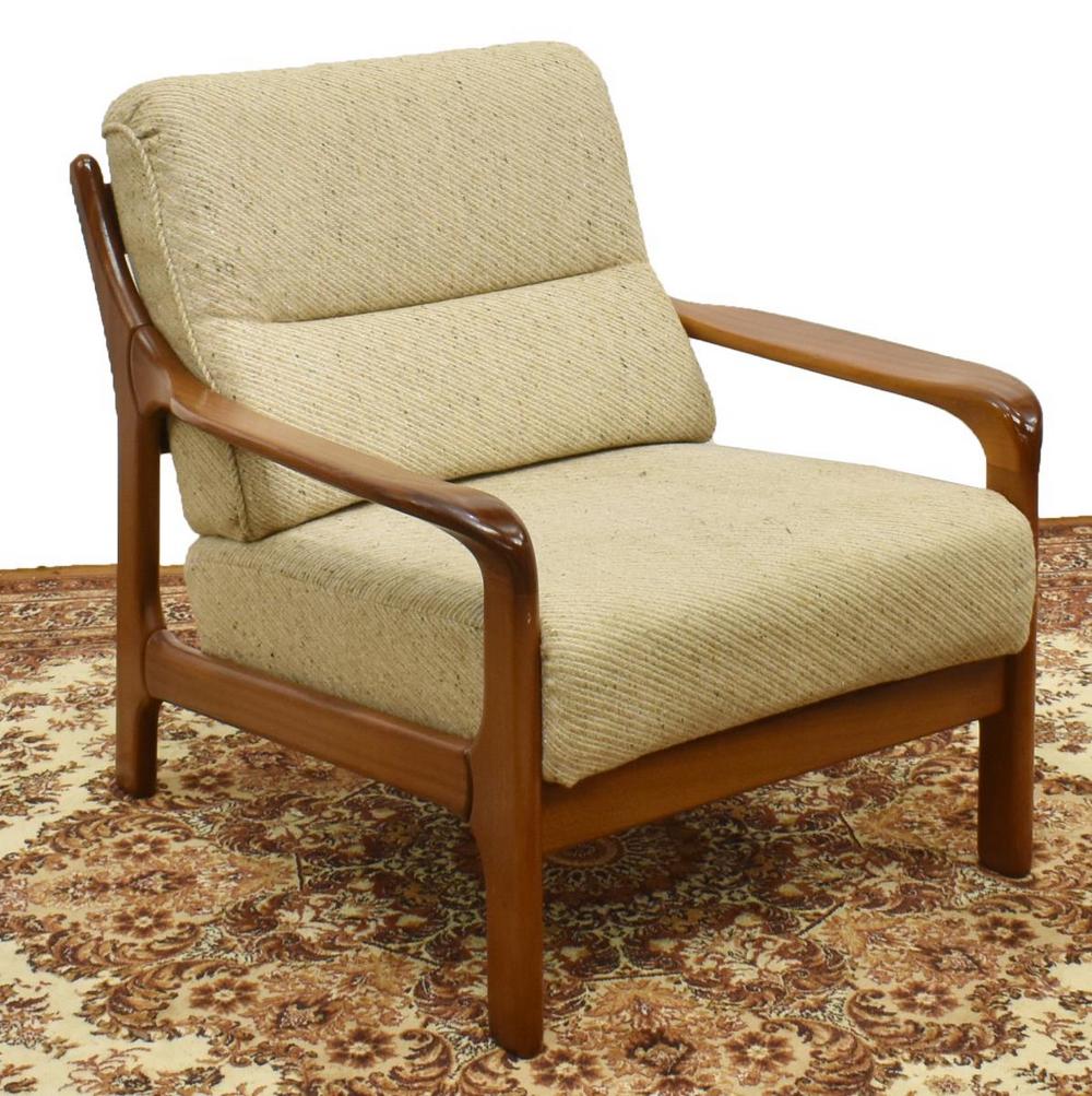 DANISH MID-CENTURY MODERN TEAK FRAME LOUNGE CHAIR: Danish mid-century modern teak armchair, c.1950s, slightly reclined with ladder back, having tan upholstered removable back and seat cushions, rising on tapered legs, approx 29"h, 29"w, 29.5"d Start P