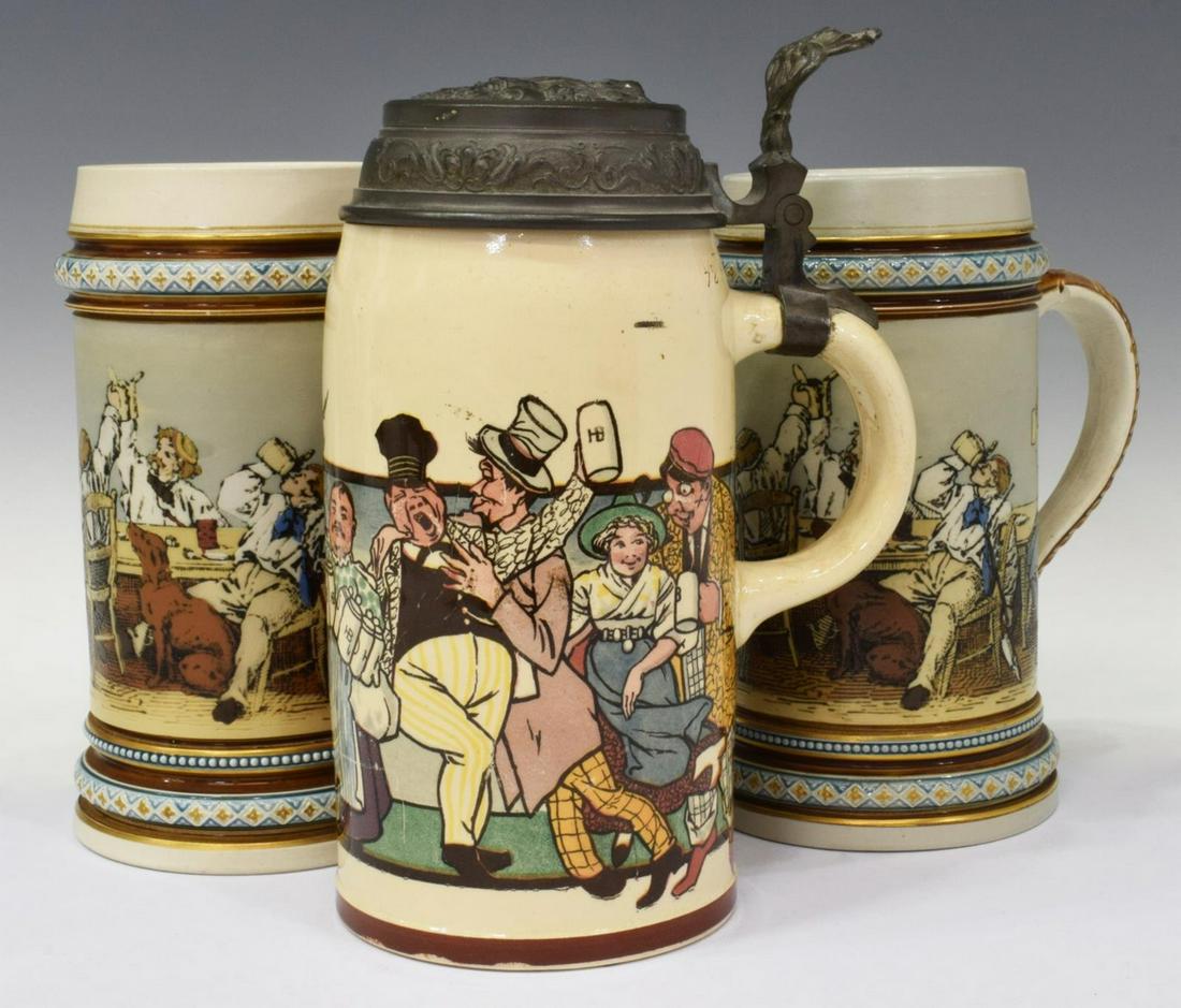 (3) GERMAN METTLACH STUDENTS, DRINKERS 0.5L STEINS: (lot of 3) German Mettlach stoneware steins, including: (2) "Students" 0.5L steins, #1146, etched design of students drinking at a tavern, lacking pewter thumb rests and lids, (one) with chip in upper