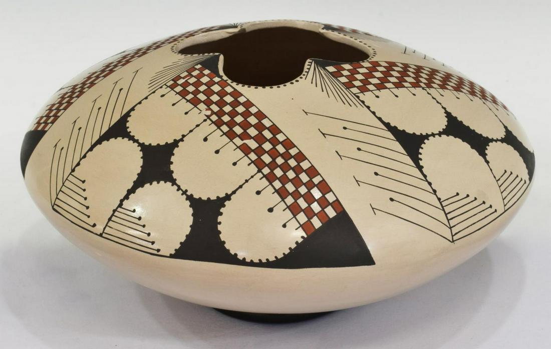ANGEL AMAYA MATA ORTIZ MEXICO POTTERY JAR: Mata Ortiz pottery jar, Mexico, signed Angel Amaya, with red and black slip designs on a white body, geometric opening, approx 3.75"h, 7.5"diam, 1lbs Start Price: $40.00