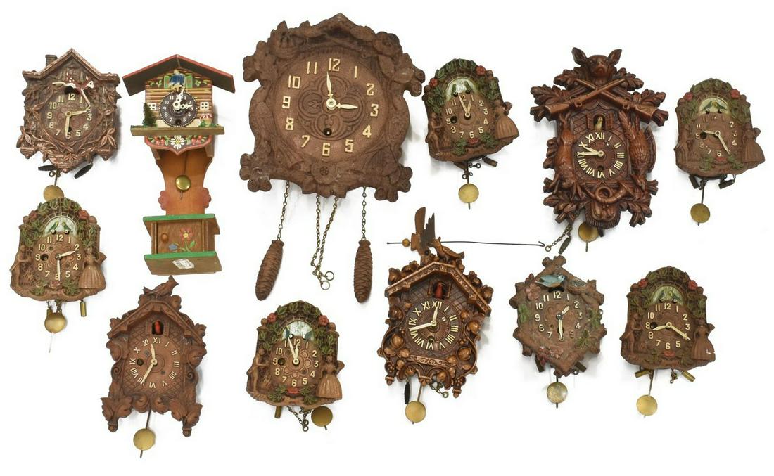 (12) KEEBLER & WATERBURY MINIATURE CUCKOO CLOCKS: (lot of 12) Collection of miniature cuckoo clocks, 20thc., of varied size and similar form, each having time only movement, with carved wood case, featuring birds, woodland animals, figures and foliat