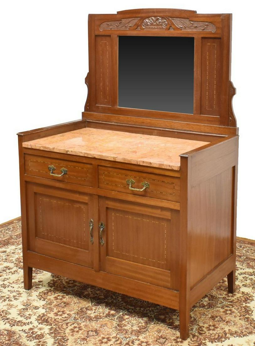 ITALIAN ART NOUVEAU VANITY TABLE & MIRROR: Italian Art Nouveau vanity table and mirror, early 20th c., backsplash with carved foliate motifs, beveled plate mirror, contrasting stringwork, over inset marble top, case fitted with two drawers, ov