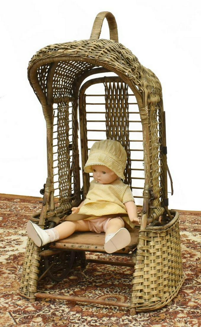 ORIOLE GO BASKET, CONVERTIBLE PERAMBULATOR C.1905: Oriole Go-Basket by Withrow Mfg., Cincinnati, Ohio, c.1905, a baby wicker perambulator convertible from a stroller, use as a bed or chair, comes lacking some parts including slide handle, comes with c