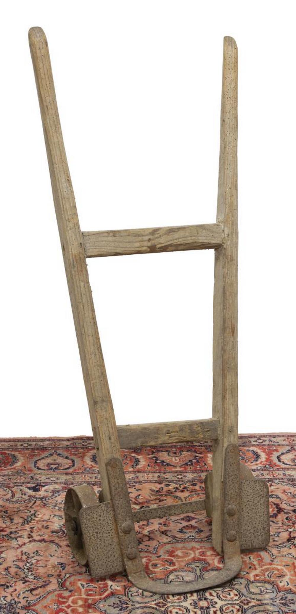 ANTIQUE PRIMITIVE PINE & IRON HAND TRUCK CART: Primitive pine hand truck, late 19th/ early 20th c., with iron axle and wheels, approx 44"h, 18.5"w, 13"d Start Price: $60.00