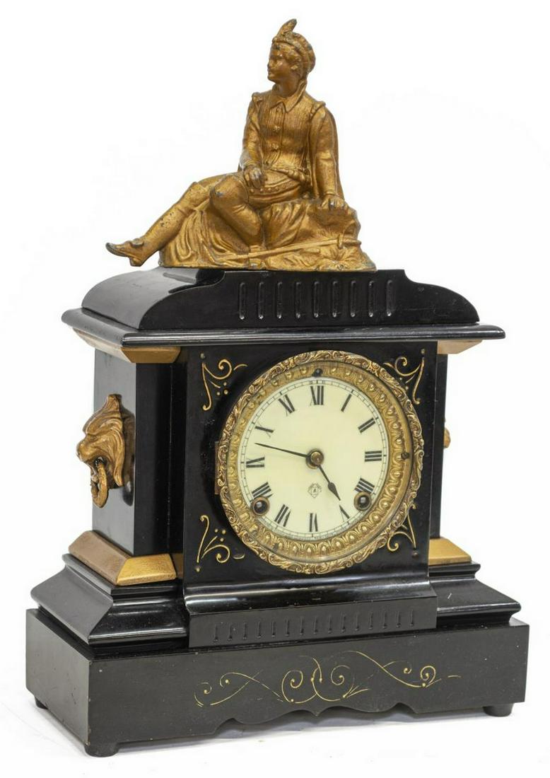 ANSONIA NEW YORK FIGURAL MANTEL SHELF CLOCK: American mantel shelf clock, Ansonia Clock Company, New York, c.1900, cast metal figural topper of a seated man, over parcel gilt and enameled cast iron case with lion mask and ring handles, white ena