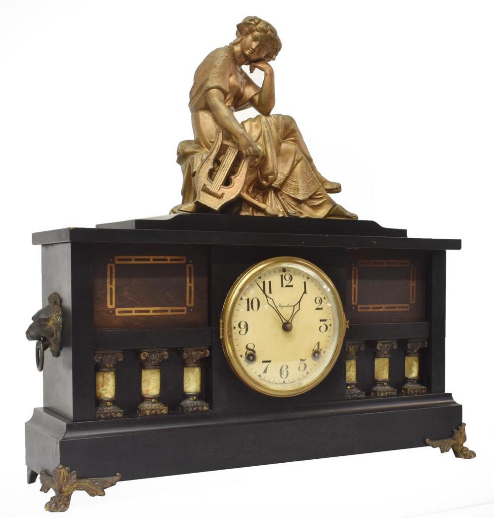 AMERICAN INGRAHAM CONN MANTEL SHELF CLOCK: American mantel shelf clock, Ingraham, Bristol, Connecticut, c.1900, figural topper of a classically dressed woman with lyre seated on Klismos chair, likely depicting Sappho, over ebonized case with h