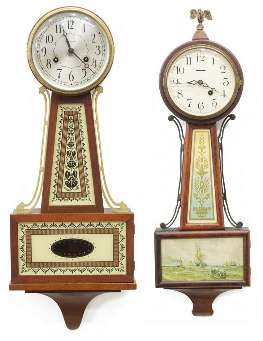 (2) AMERICAN NEW HAVEN & SETH THOMAS BANJO CLOCKS: (lot of 2) American banjo clocks, including: (1) New Haven Clock Co., with eagle finial, enameled dial with Arabic numerals, time only movement, (1) Seth Thomas, silver-tone dial with Arabic numerals,