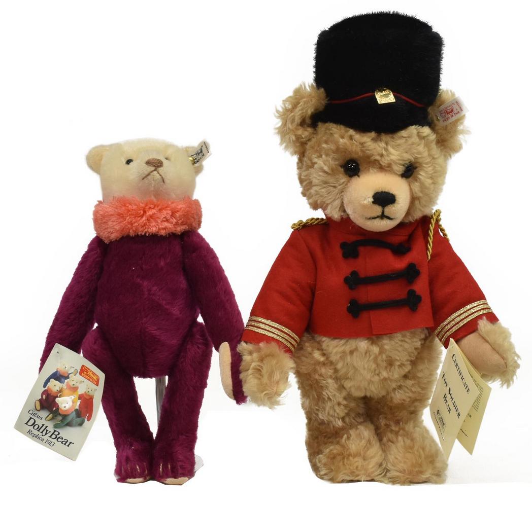 2) STEIFF MUSICAL TOY SOLDIER & CIRCUS DOLLY BEARS: (lot of 2) German Steiff teddy bears, comprising: (1) limited-edition "F.A.O. Schwarz 1996 Musical Toy Soldier Bear," 652158, retaining branded dustbag, approx 15"h, 9"w, 4.75"d; (1) burgundy "Circus 