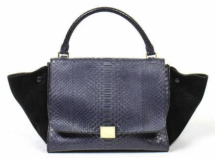 CELINE 'TRAPEZE' BIOCLOLOR SUEDE & SNAKESKIN BAG: Celine bicolor "Trapeze" bag, from a collection by Phoebe Philo, in black suede and navy blue snakeskin leather, with gold-tone hardware, single rolled top handle, optional shoulder strap, single zip