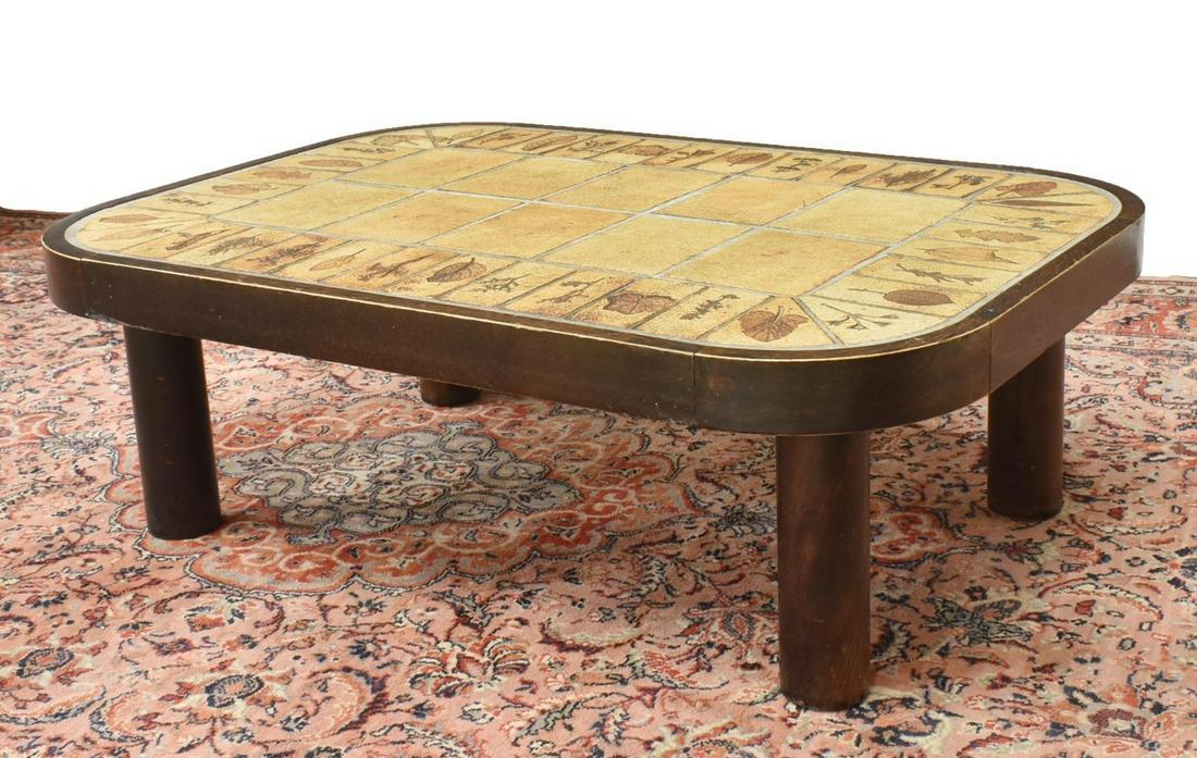 ROGER CAPRON (D.2006) MODERN TILE TOP COFFEE TABLE: French modern coffee table, c.1960s, rounded rectangular wood frame, earthenware tiled top with impressed leaf design, tile with partially obliterated signature, attributed to Roger Capron (Vallauris,