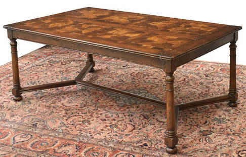 JONATHAN CHARLES WALNUT PARQUET INLAY COFFEE TABLE: Walnut parquet coffee table, Jonathan Charles Fine Furniture, 21st c., numbered 493413, in distressed finish, having inlaid geometric parquet motif to rectangular top, over cross stretcher-joined turn