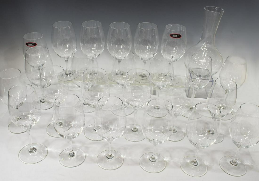 (25)RIEDEL COLORLESS OUVERTURE STEMWARE & DECANTER: (lot of 25) Riedel colorless glass wine stemware and decanter, all having acid etched mark underfoot, comprising: (8) Ouverture Magnum wine glasses, approx 8.25"h, 2.5"diam, (8) Ouverture red wine gla
