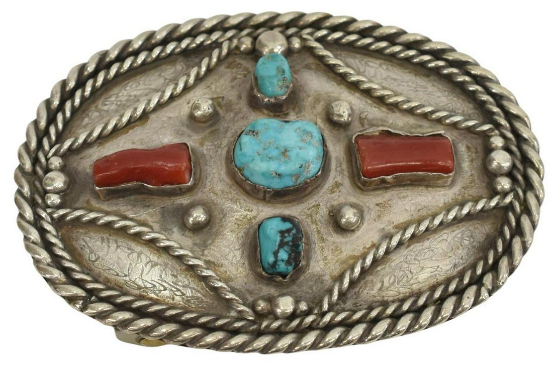 NATIVE AMERICAN SILVER TURQUOISE RED CORAL BUCKLE: Native American silver (content unknown) belt buckle, signed K, with twisted wirework, red coral and turquoise, (one) turquoise stone loose in the bezel, approx 2.25"h, 3"l, 49.5 grams (inclusive of a