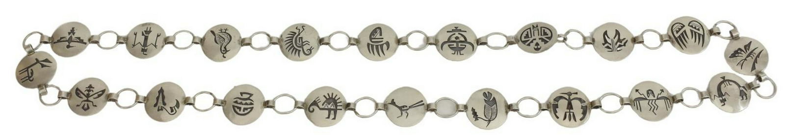 NATIVE AMERICAN WILLIE YAZZI SILVER OVERLAY BELT: Native American silver (content unknown) overlay link belt, partial picto hallmark, possibly Willie Yazzie Jr. (Navajo, 20th c.), each disc with unique design, including bear paw, quail, Yeii figure, 