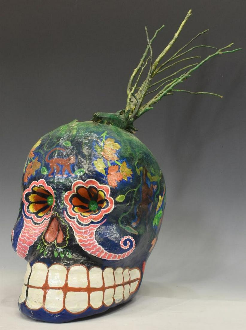 FELIPE LINARES (B.1936) PAINTED PAPIER-MACHE SKULL (1 of 6)
